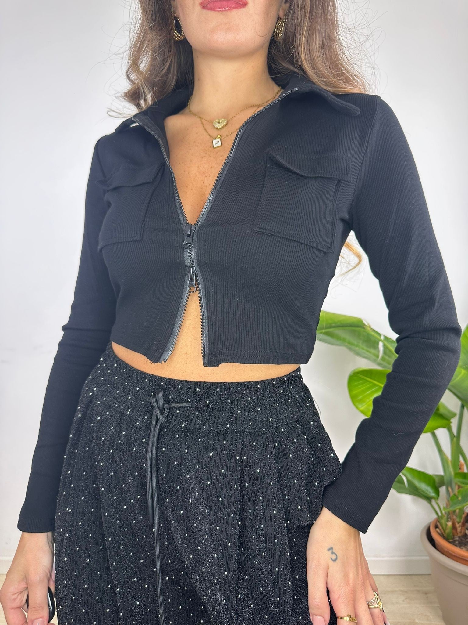 POLO CROP A COSTINE NERA