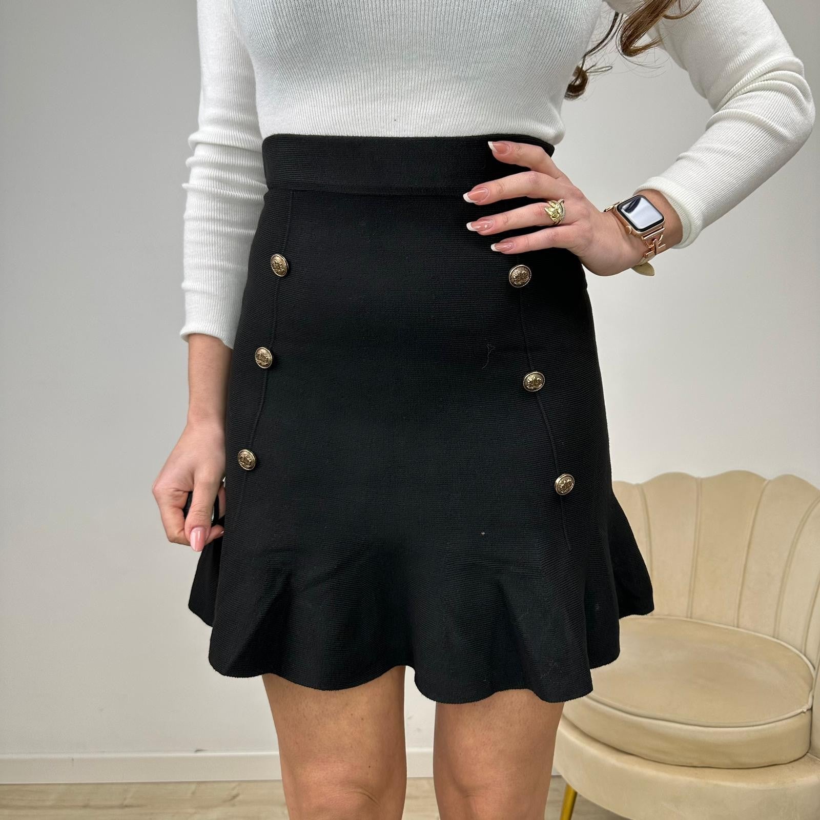 MINIGONNA CON VOLANT