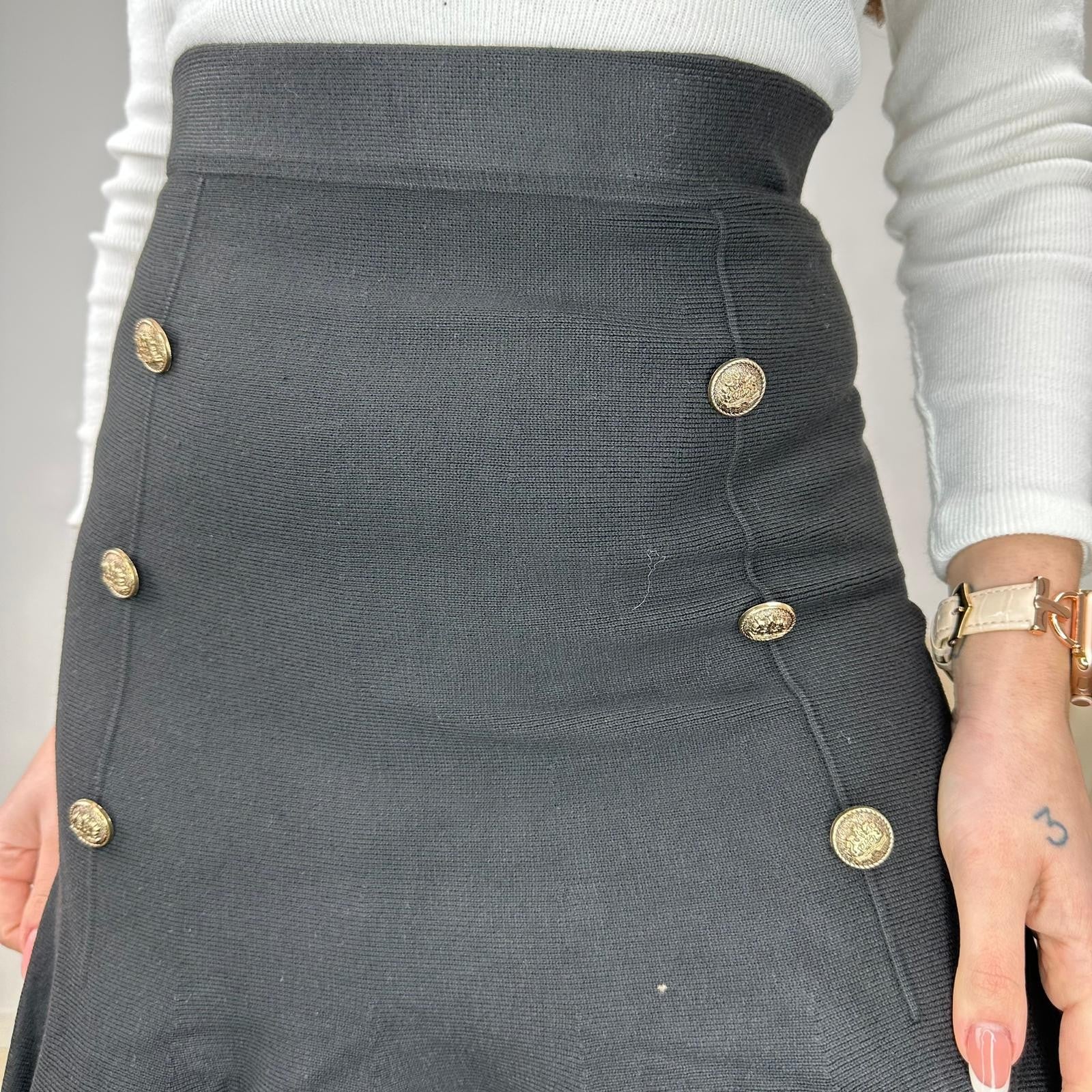 MINIGONNA CON VOLANT