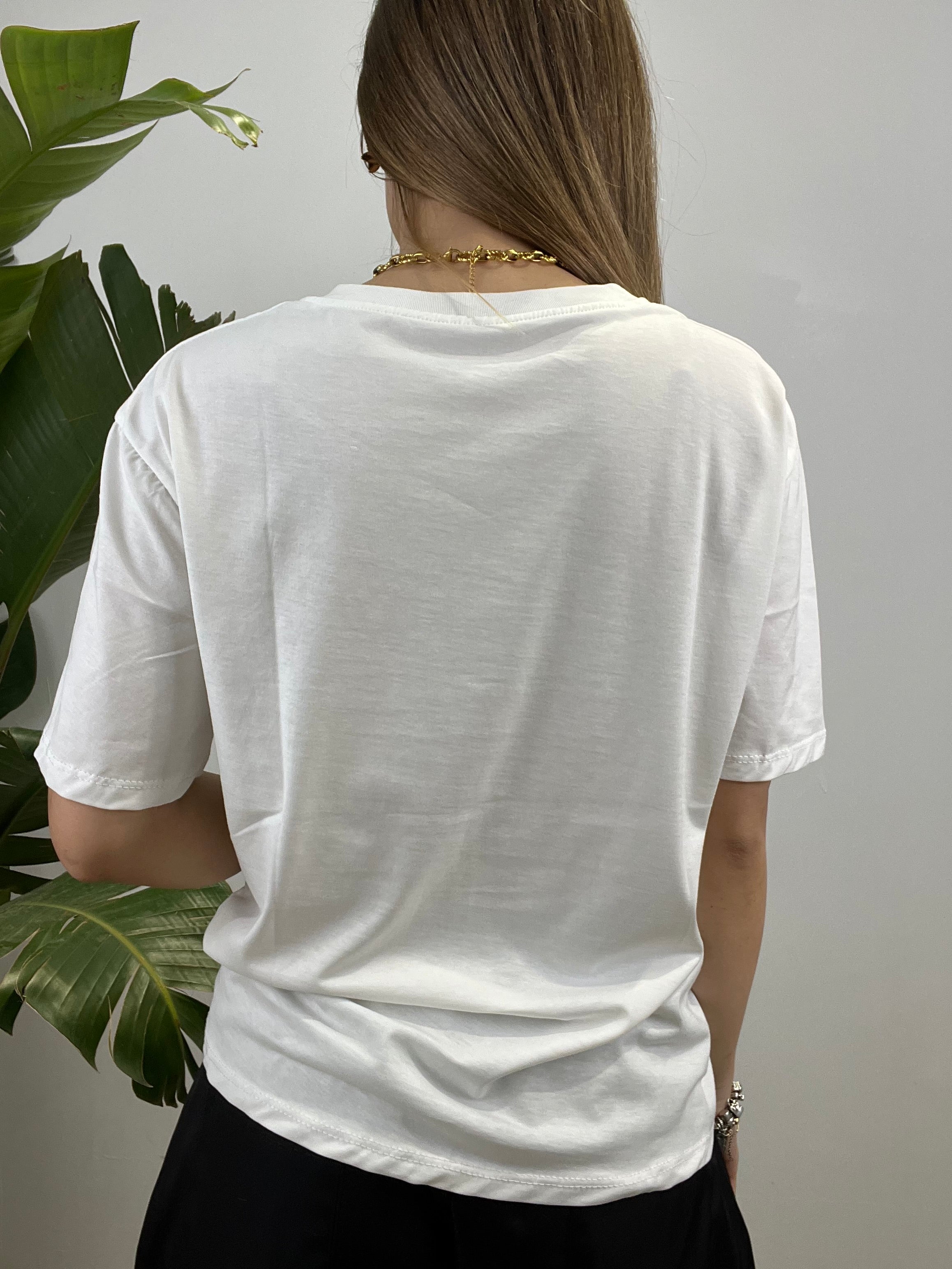 T-SHIRT CON SCRITTA " TORNA DA TUA MADRE" NERA